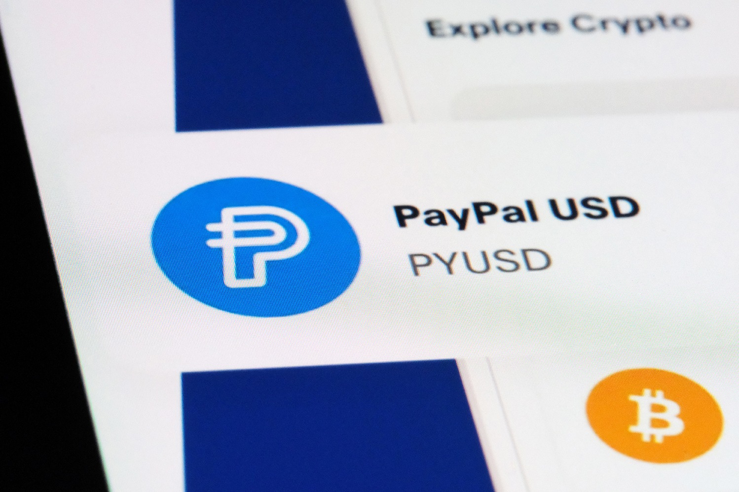 PayPal PYUSD image with a Bitcoin logo. PayPal Stablecoin.