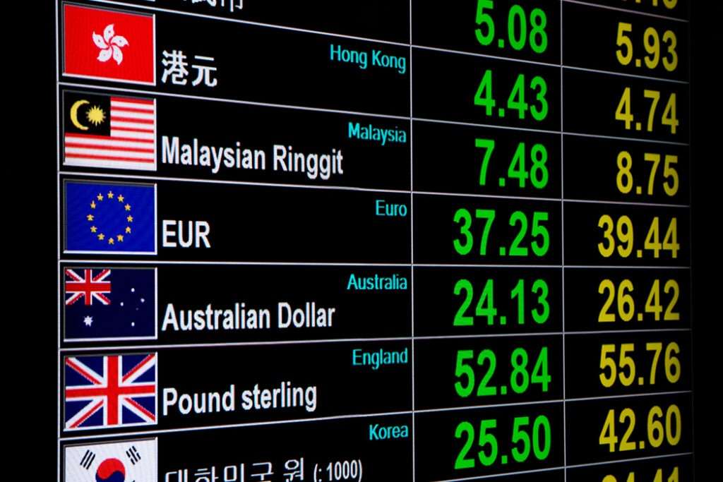 Currency exchange rate on digital LED display board.